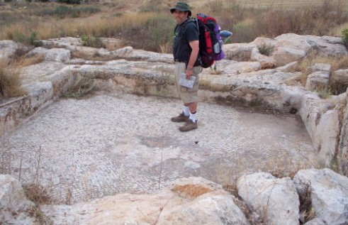 Don standing on a mosaic at Nevallat ruins near Rt. 6 