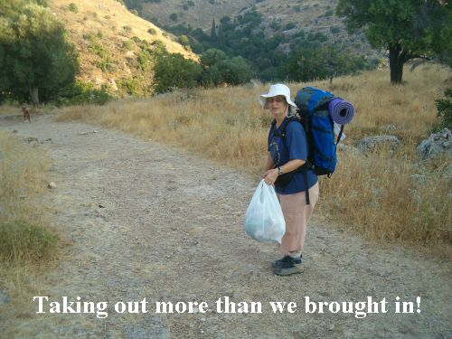 Diana taking our trash from the trail