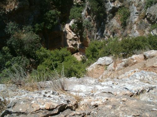 Looking down a cliff on the north side of Wadi Amud