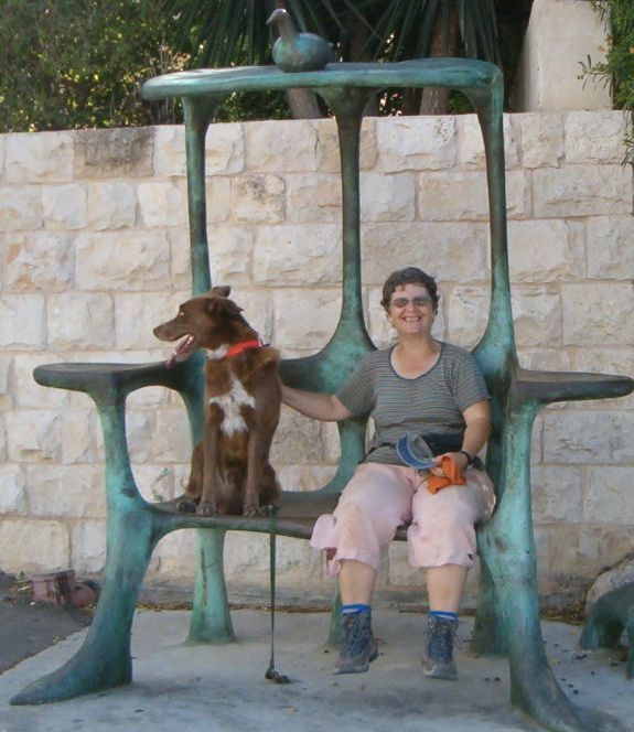 Diana and Taffy in Ein Hod sitting on sculpture bench