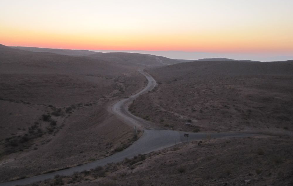 Sun rise over the junction between the access road to Machtesh HaKatan and Route 227 just about to start down the scorpian ascent (מעלה עקרבים )