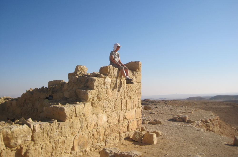 Diana sitting on a wall of the ruin of the Roman outpost Meizad Zafir ( מצד צפיר ),