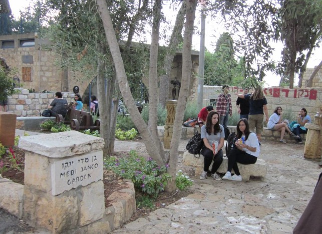 Ein Hod public square with school kids